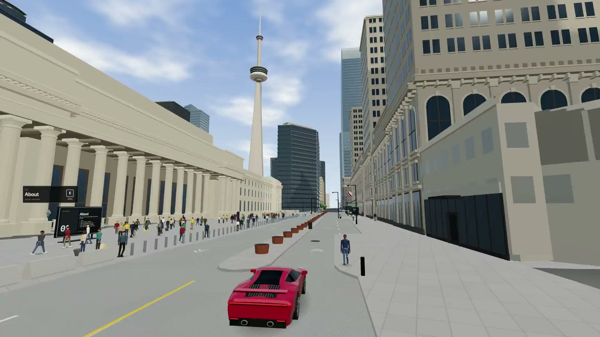 The red 911 on Front Street by Union Station's colonnade, the CN Tower ahead.